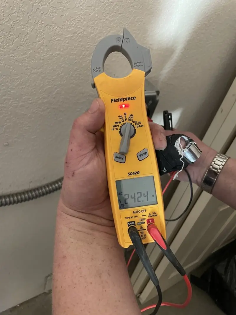 Voltage testing with clamp meter during Hot Tub / Pool Electrical Wiring in Lakewood